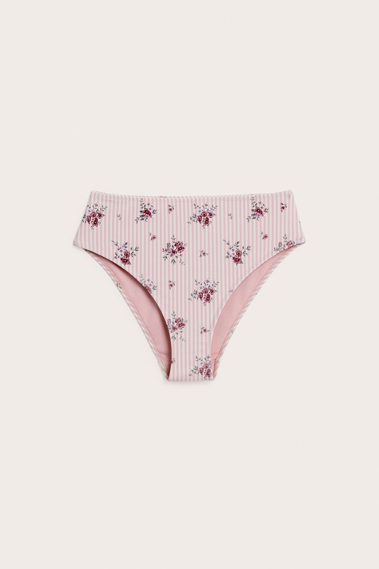 Front view of women's high-cut briefs with pink and white stripes and floral print.