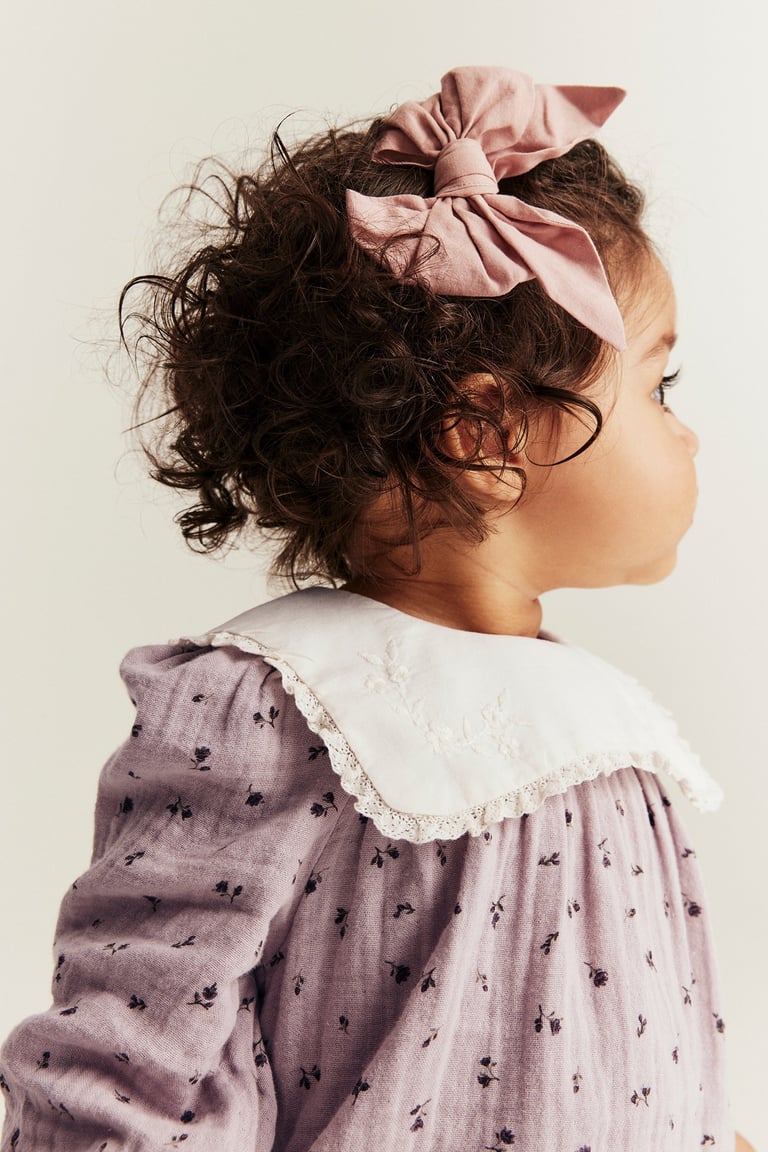 Floral jumpsuit with frill | Light beige | Baby | Newbie