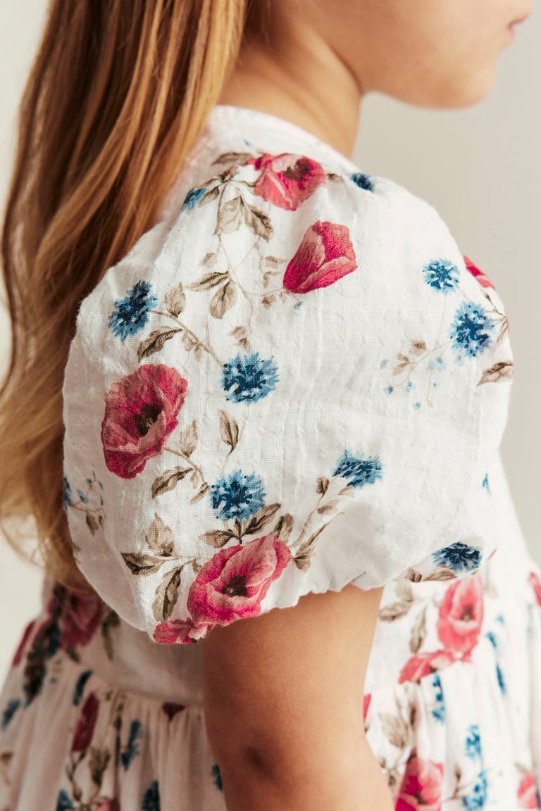 white dress with pink and blue flowers ZAPAKA Women White Blue Flower Long Prom Dress With Slit A-Line Spaghetti Straps Ruched Corset Evening Dress, White Blue Flower / US6